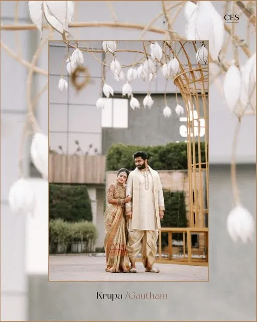 A couple framed by wedding décor — Classic Frames Studios